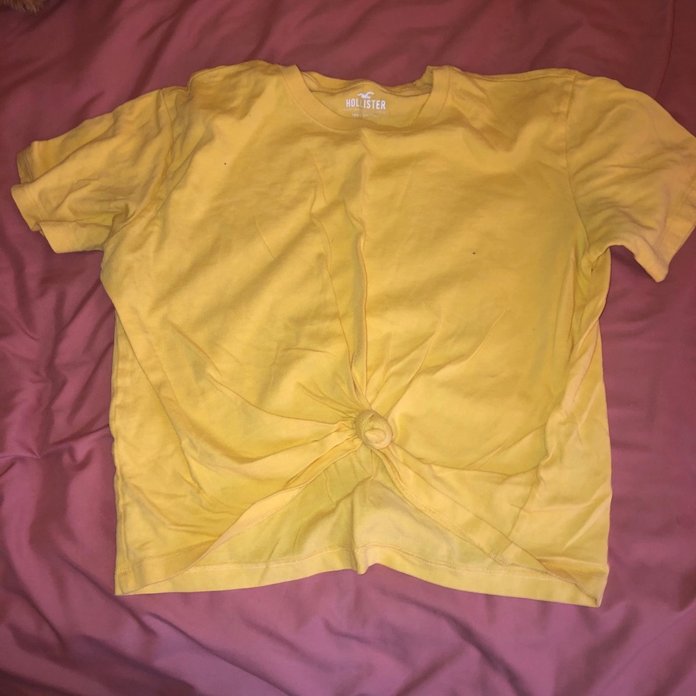 yellow crop top with knot in the front
